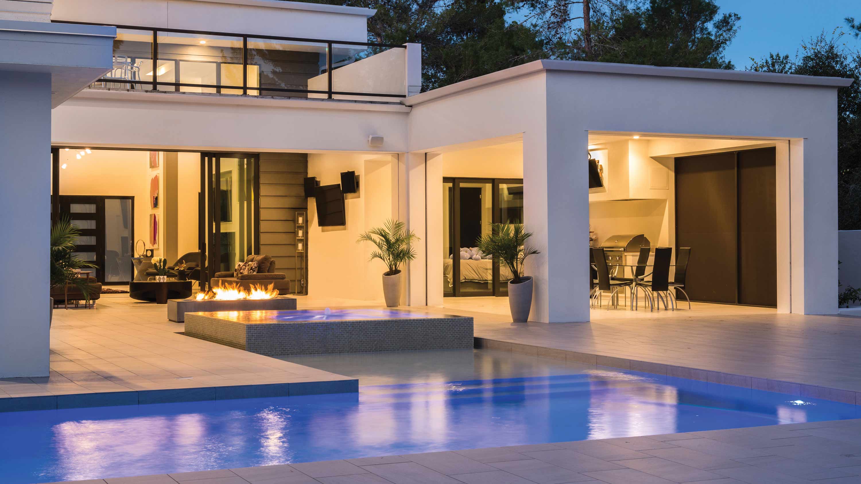 lutron image of pool at dusk