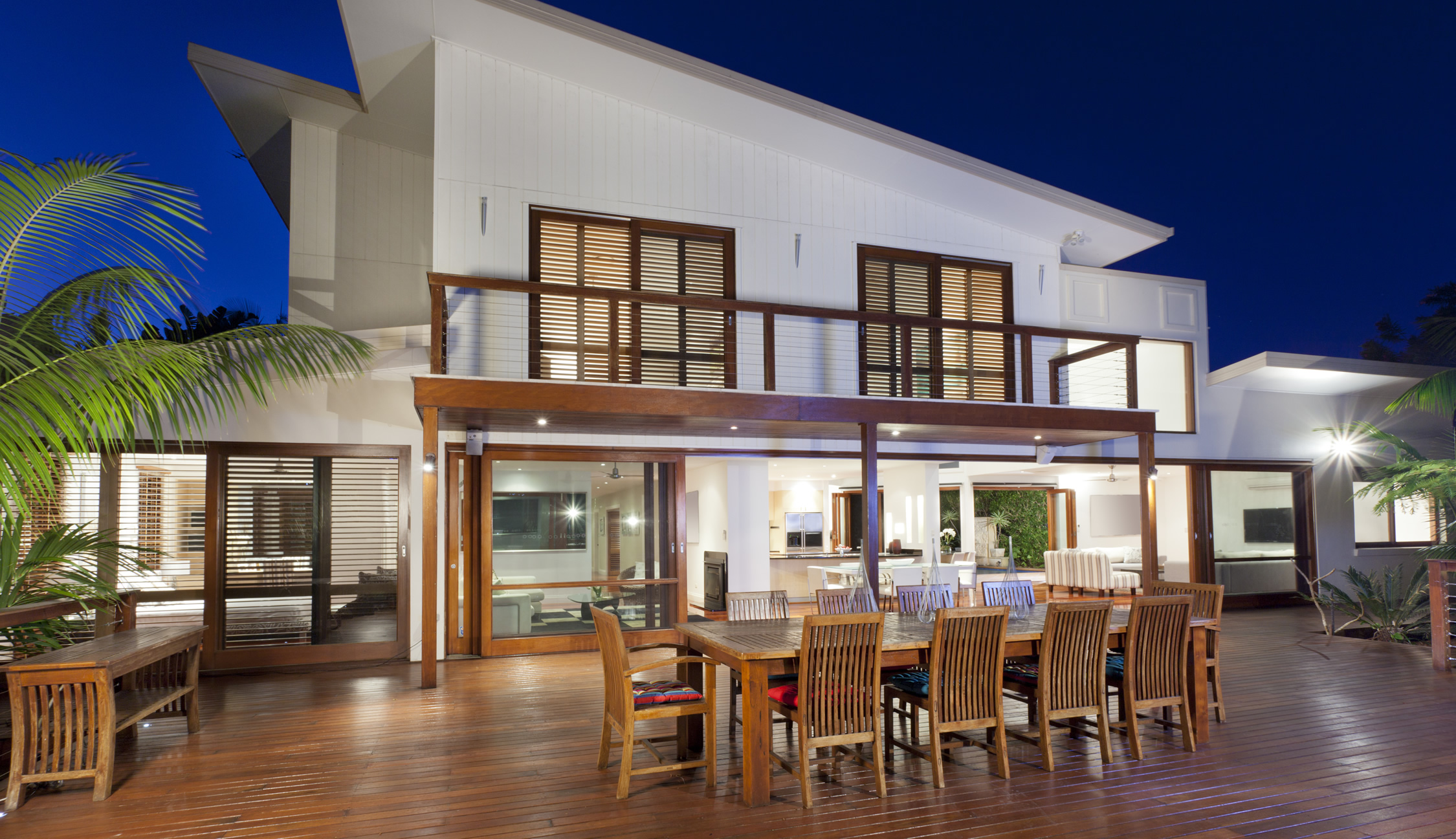 wooden deck with wooden furniture on it